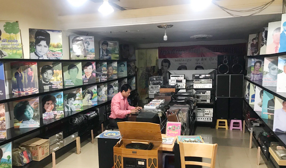 Dara works in his archive in Meanchey district, Phnom Penh.
