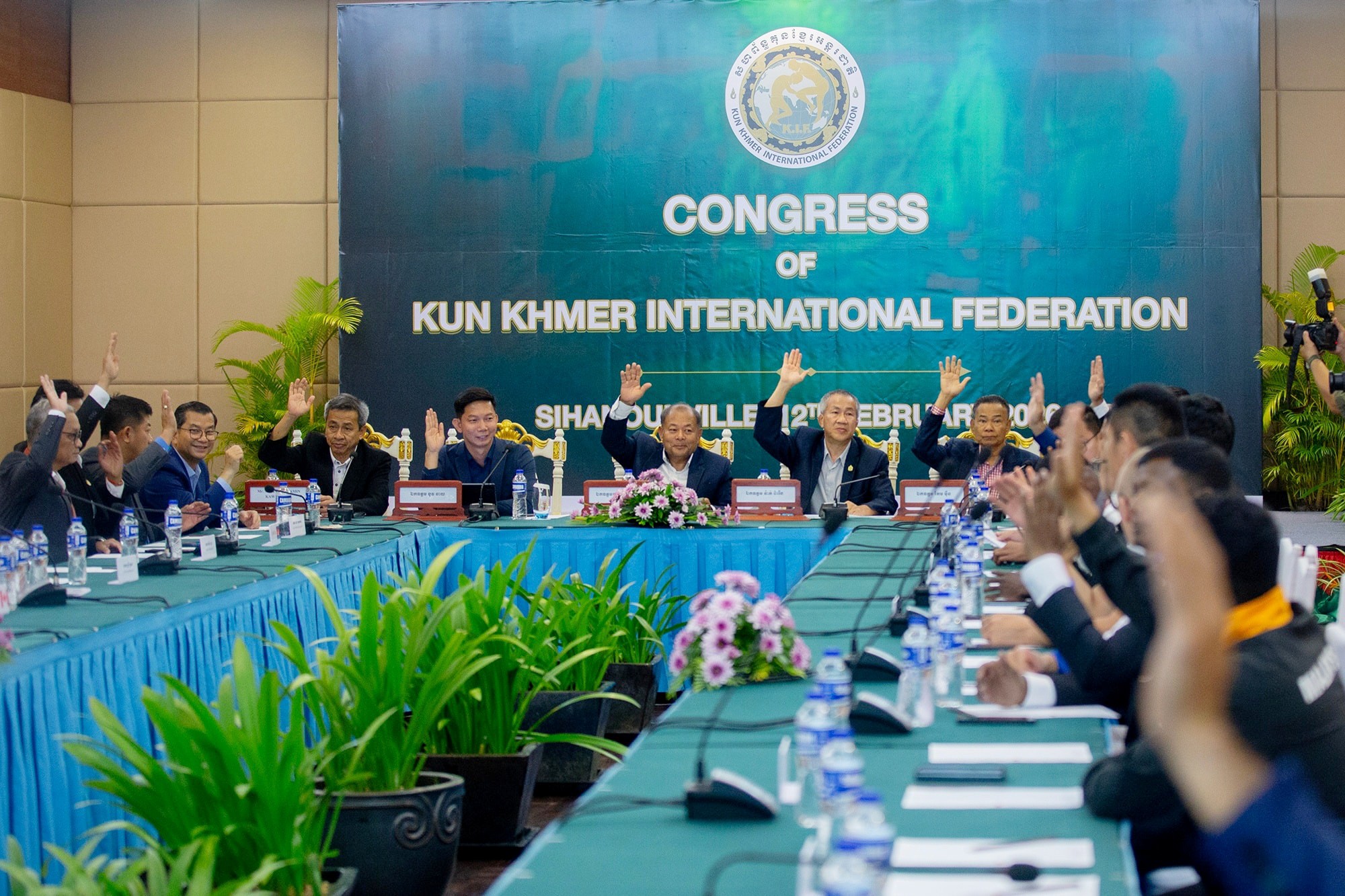 Members of the KIF executive committee and representatives of member countries raise their hands in support of the newly elected leadership, reaffirming their shared goal of securing Olympic recognition and inclusion for Kun Khmer. Supplied