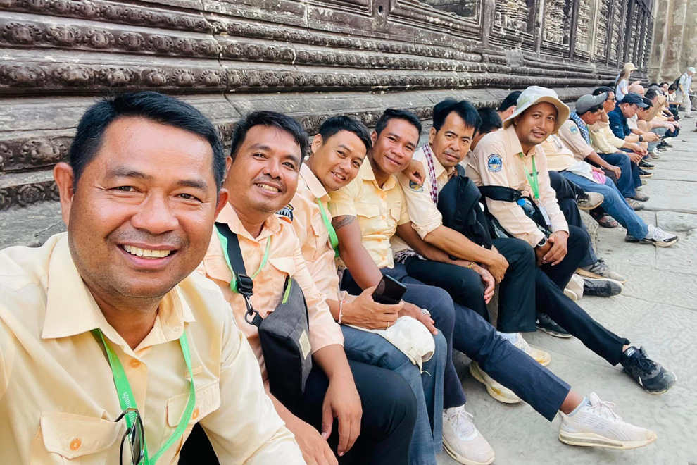 Tour guides pose for a selfie while they wait for new clients to share their knowledge with. Supplied