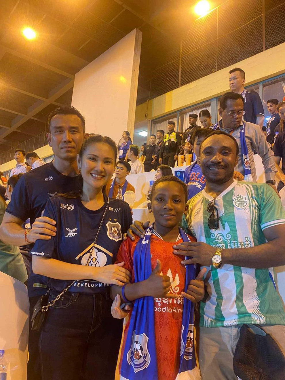 Wisdom has attracted the attention of several high-profile fans. From left to right: Dy Vichea, Hun Mana, Wisdom and his father. Supplied