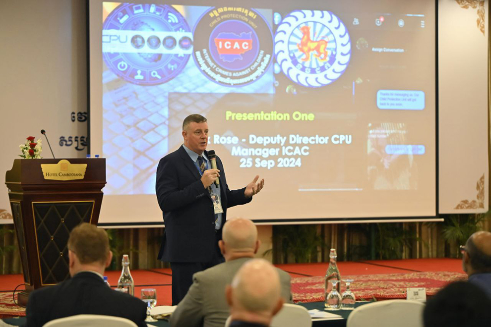 Nick Rose, deputy director of the Child Protection Unit (CPU) and a former Australian federal police officer, delivers a presentation during the forum. Supplied