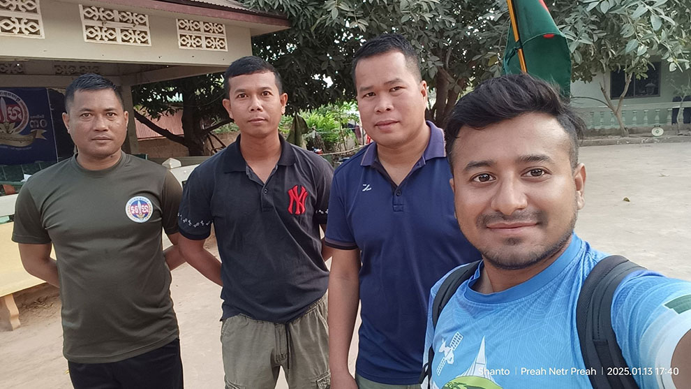 Shanto with a police officer in Siem Reap province. Supplied