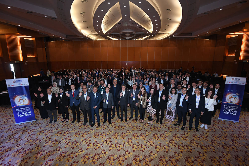 The attendees pose for a group photo with Liew Chin Tong, Malaysian Deputy Minister of Investment, Trade and Industry at the ASEAN Economic Opinion Leaders Conference. Supplied