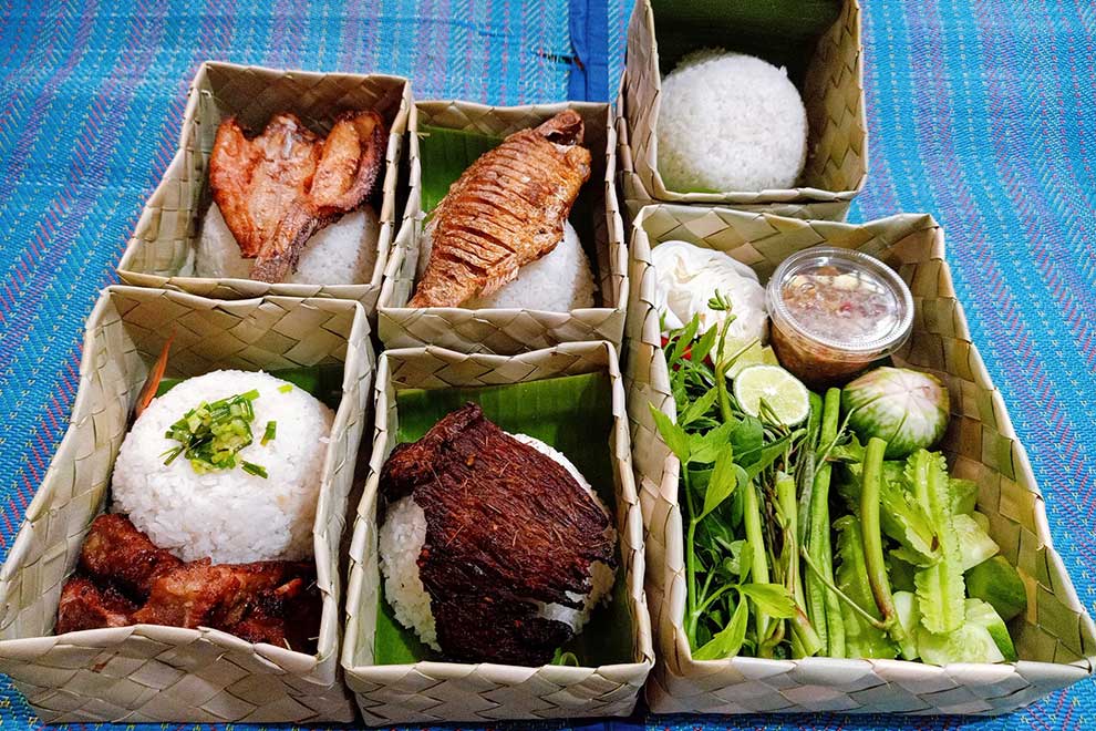 Traditional palm leaf boxes helping to reduce plastic use Traditional palm leaf boxes helping to reduce plastic use
