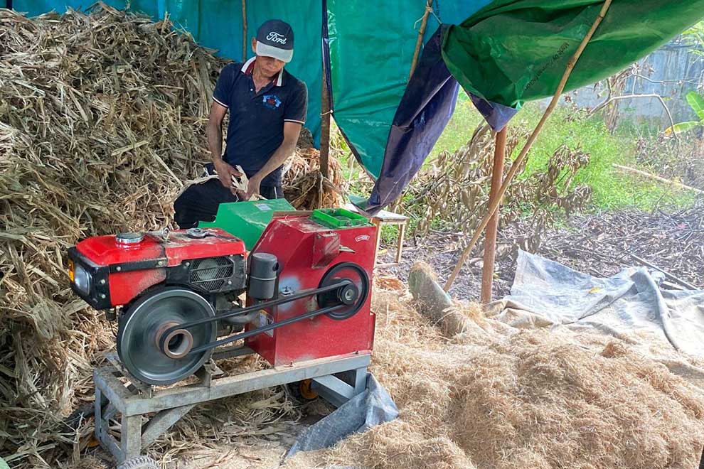 One of MG’s workers turns sugarcane into pulp, used to manufacture the paper plates. SUPPLIED