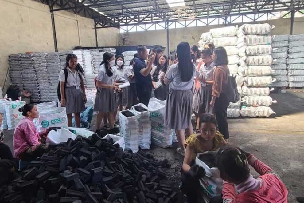 Community fights deforestation with coconut charcoal
