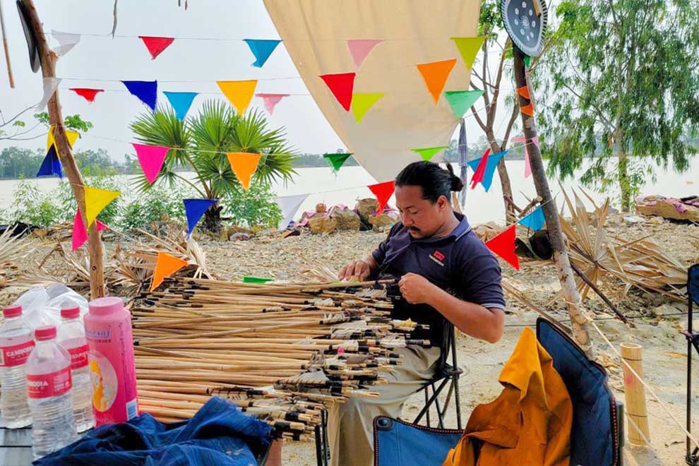 Til Channlin and his bows at an Angkor Sangkran event during Khmer New Year. CHANNLIN FB