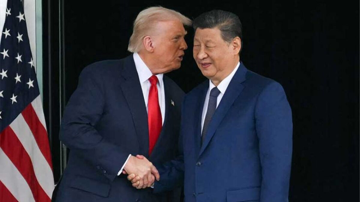 US President Donald Trump (L) and China's President Xi Jinping shake hands as they leave after their talks at the Gimhae Air Base, located next to the Gimhae International Airport in Busan on October 30, 2025. PHOTO: AFP