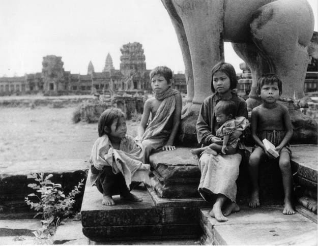Khmer Rouge Survivors heroes as we mark Day of Remembrance May 20 Khmer children rest in the shadow of Angkor. January 10, 1079. Dinh Phong/DC-Cam